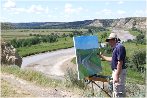 Greg Walter, DSU professor, painting outdoors