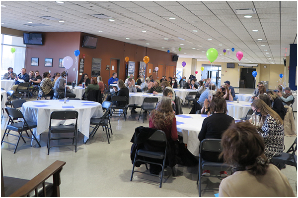 Photo of many faculty at the award event