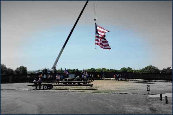 American flag over traveling wall