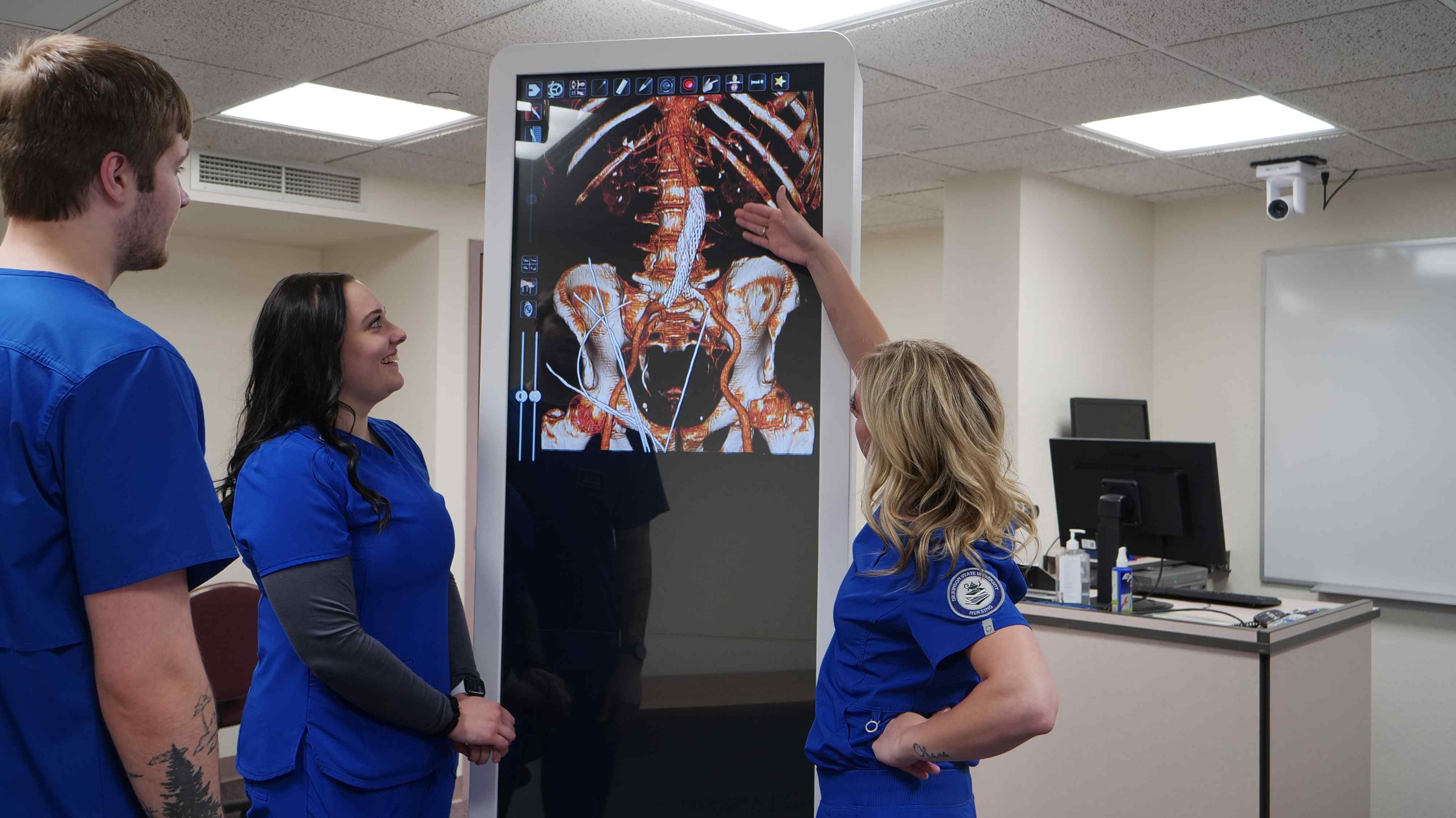Nursing students using cadaver lab