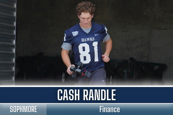 Cash Randle running out of the BAC football tunnel on gameday