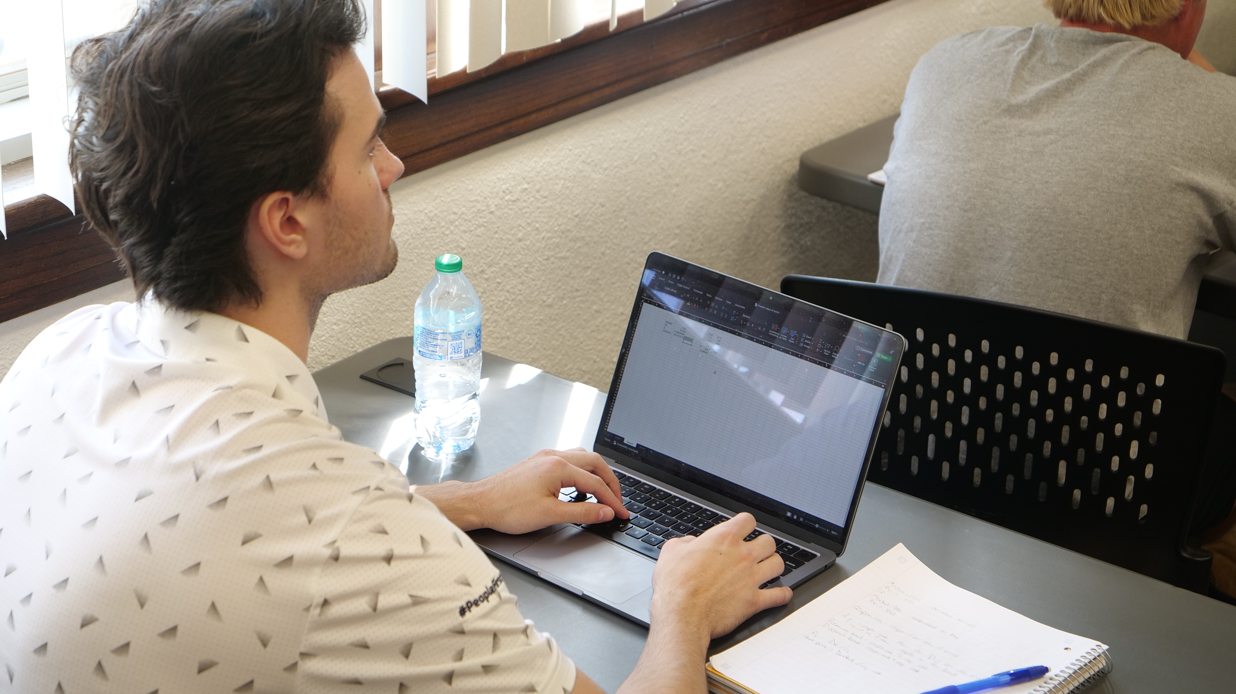 student attending business class