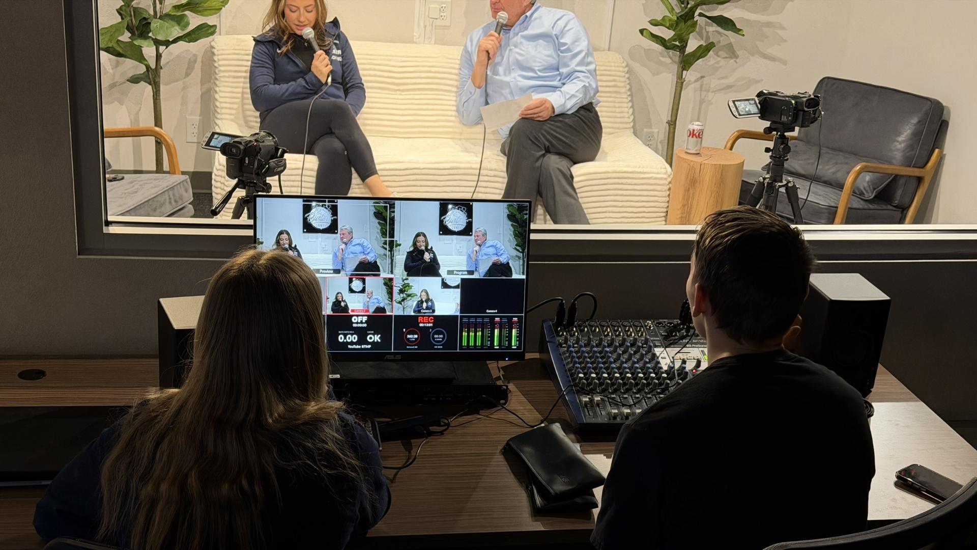 Control booth in the Hawk Media Lab showing an interview in progress